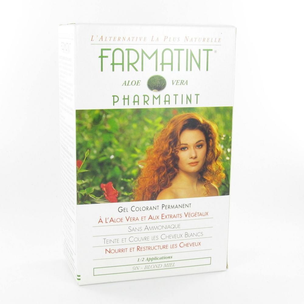 Boîte de gel colorant FARMATINT. Inscription: Aloe Vera, 9N blond miel. Femme aux cheveux roux sur l'emballage.