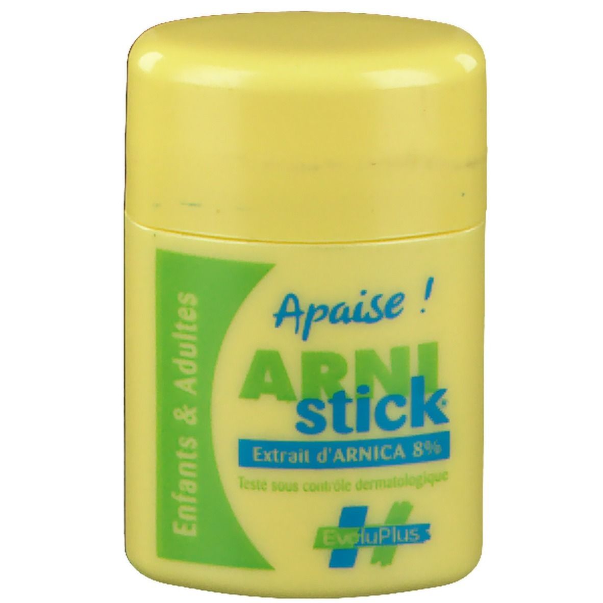 Tube cylindrique jaune. Étiquette verte avec texte: ARNIstick, Extrait d'Arnica 8%. Enfants & Adultes.