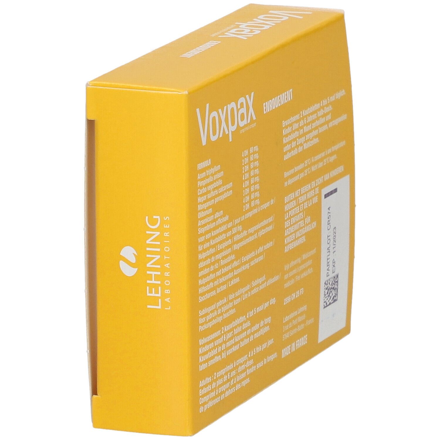 Dos incliné de la boîte jaune "Voxpax". Texte et informations fabricant.