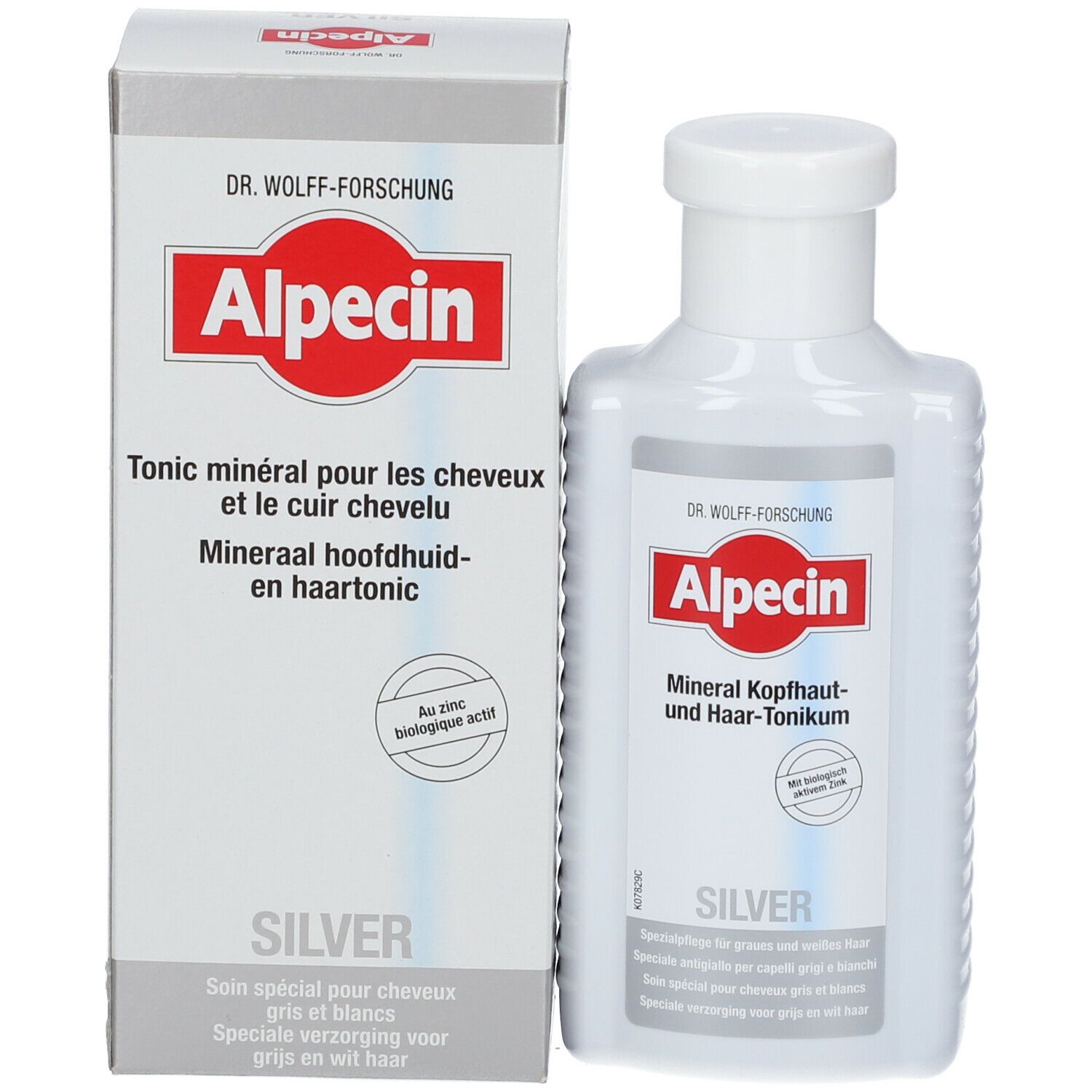 Verpakking en fles. Verpakking: wit en zilver met rood logo en tekst: Alpecin, Silver. Fles: wit, zelfde logo.