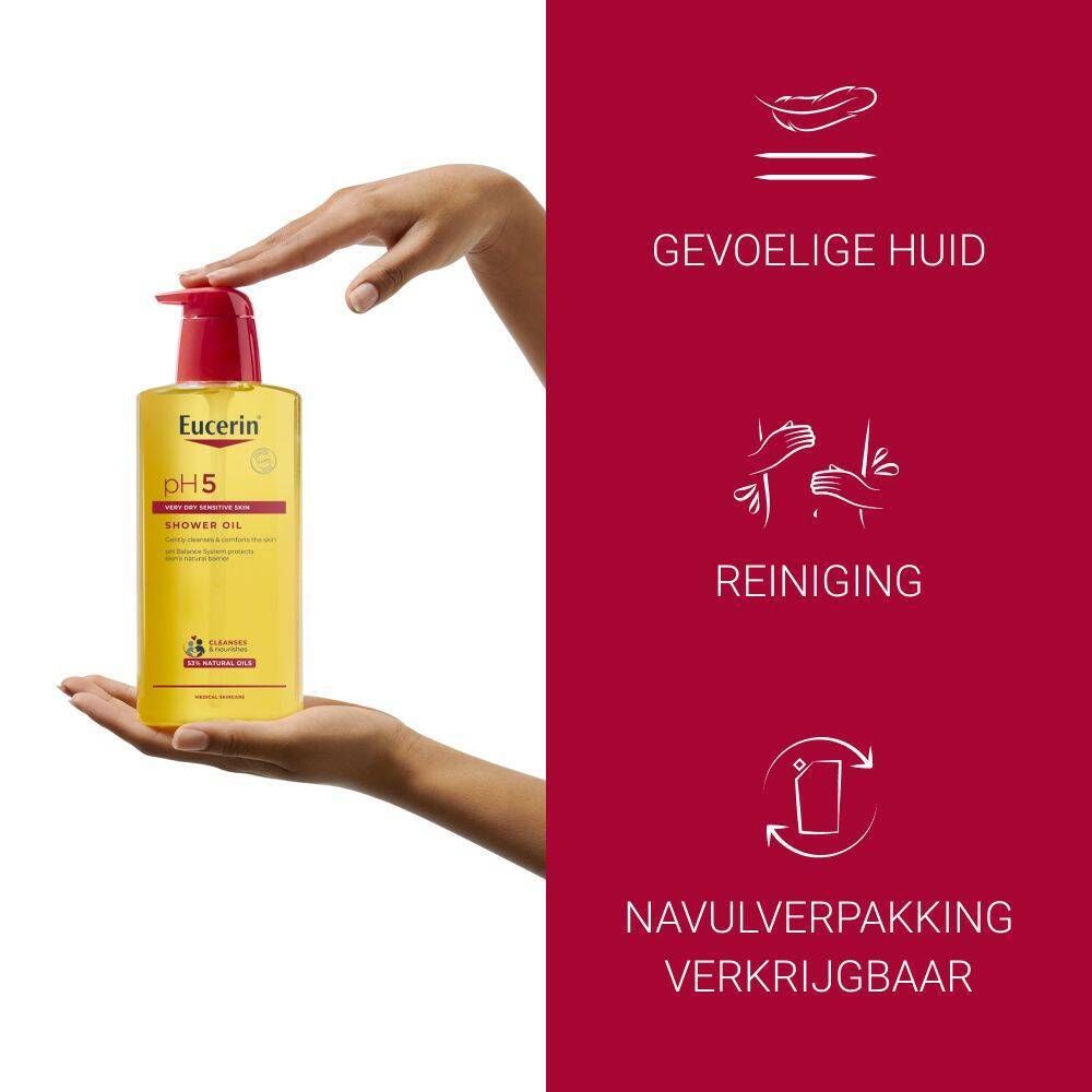 Hand houdt Eucerin pH5 doucheolie fles vast. Tekst: Gevoelige huid, reiniging, navulverpakking verkrijgbaar.