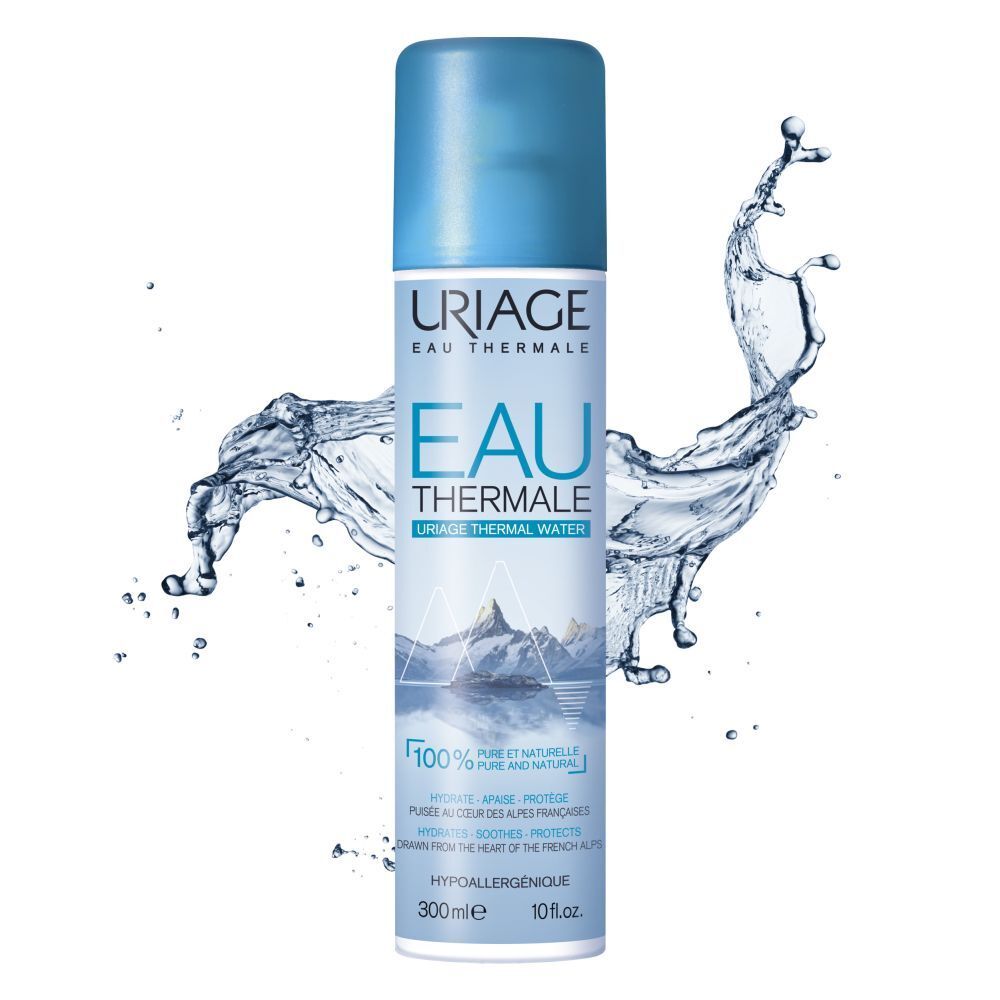 Uriage Eau Thermale spray. Blauwe spuitfles met blauwe dop. Waterspetters.