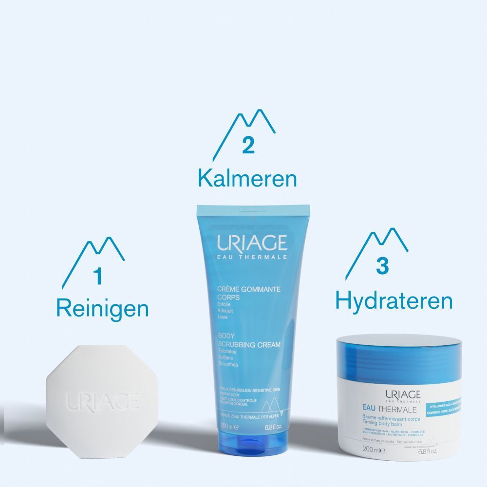 Drie producten naast elkaar. Zeep, crème, crème. Uriage-logo. Tekst: Reinigen, Kalmeren, Hydrateren.
