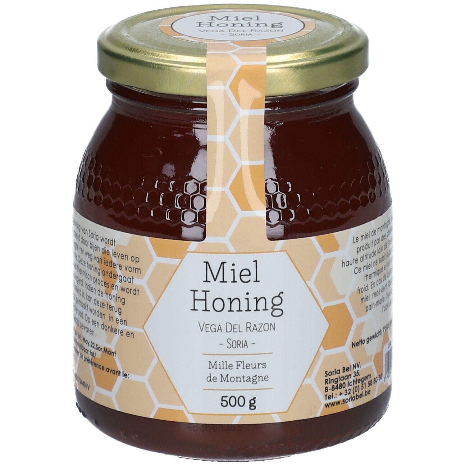 Glazen pot honing met gouden deksel. Etiket met productnaam, merk en gewicht. Honing donkerbruin.