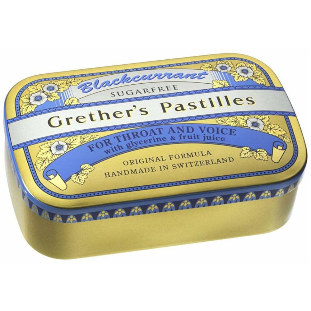 Goldene Dose mit blauer Verzierung. Aufschrift: Grether's Pastilles, Blackcurrant, zuckerfrei. Hergestellt in der Schweiz.