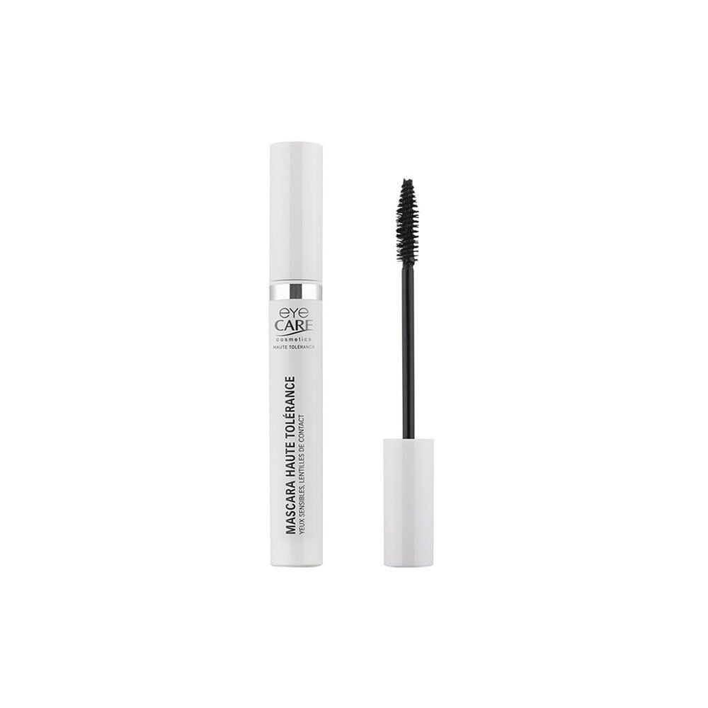 Tube de mascara blanc avec brosse noire. Bouchon retiré.