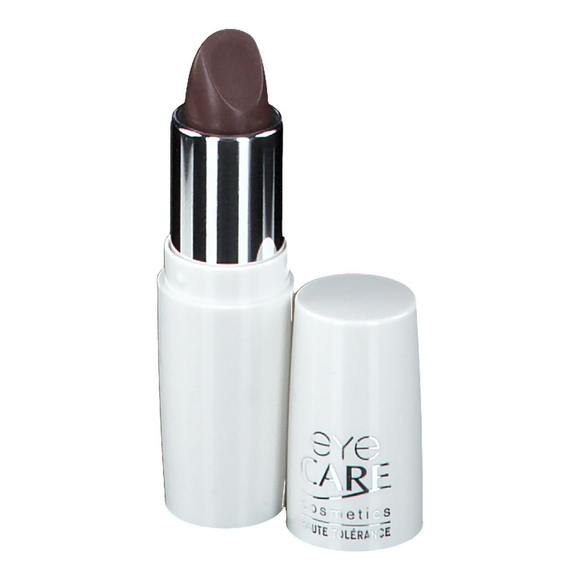 Rouge à lèvres marron clair, pointe arrondie, dans un étui blanc avec bague argentée. Capuchon à côté. "EYE CARE cosmetics" sur le capuchon.