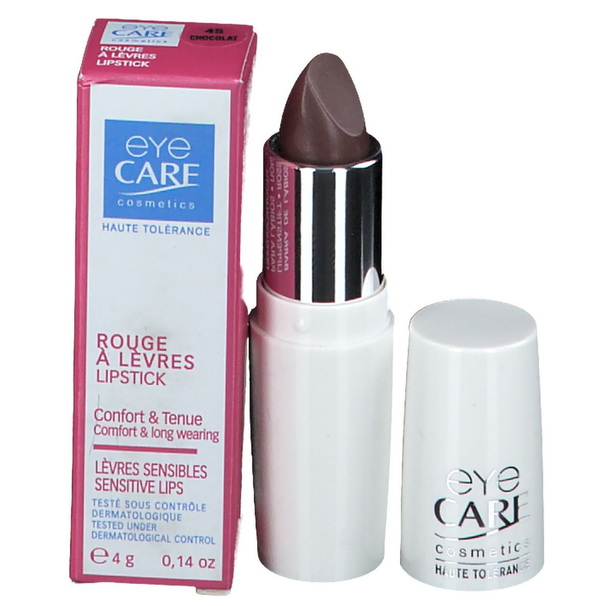 Rouge à lèvres marron clair, pointe arrondie, dans un étui blanc avec bague argentée. Capuchon à côté. "EYE CARE cosmetics" sur le capuchon. Emballage à côté.