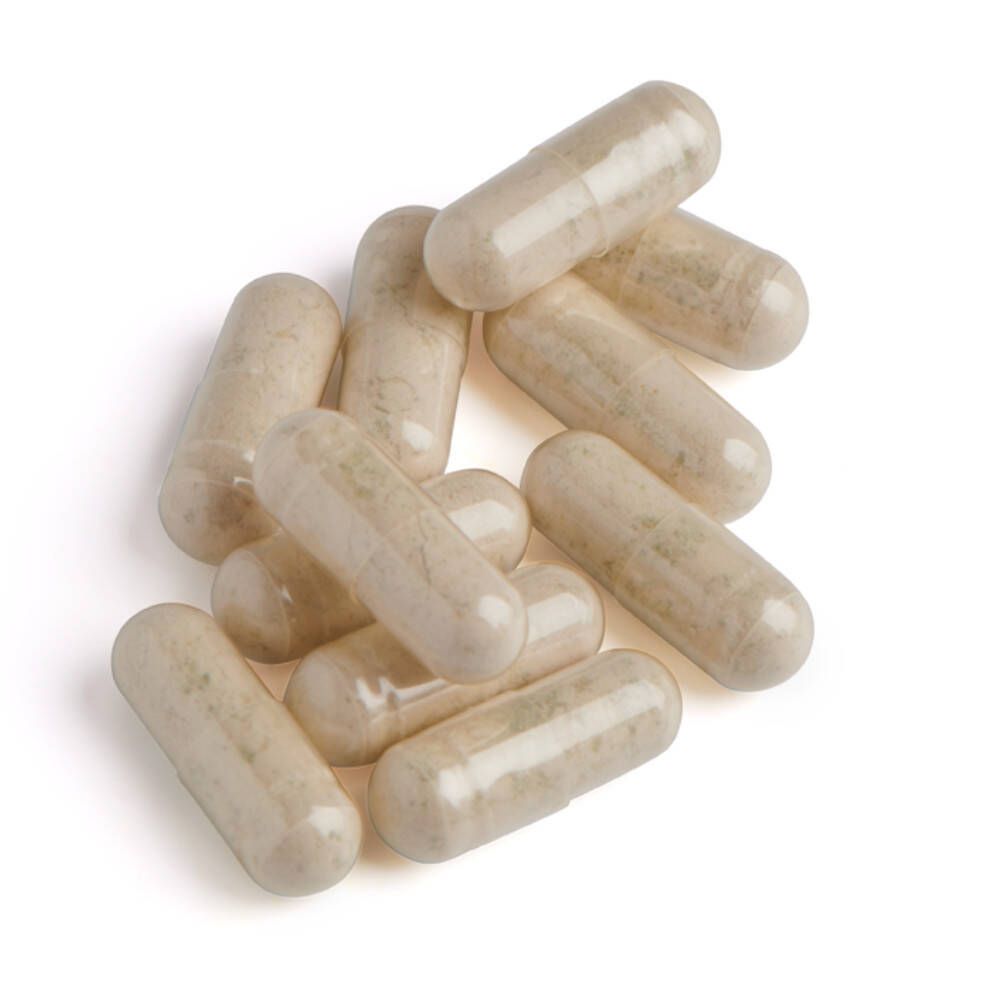 Dix capsules oblongues beiges sur fond blanc. Aucune inscription visible.