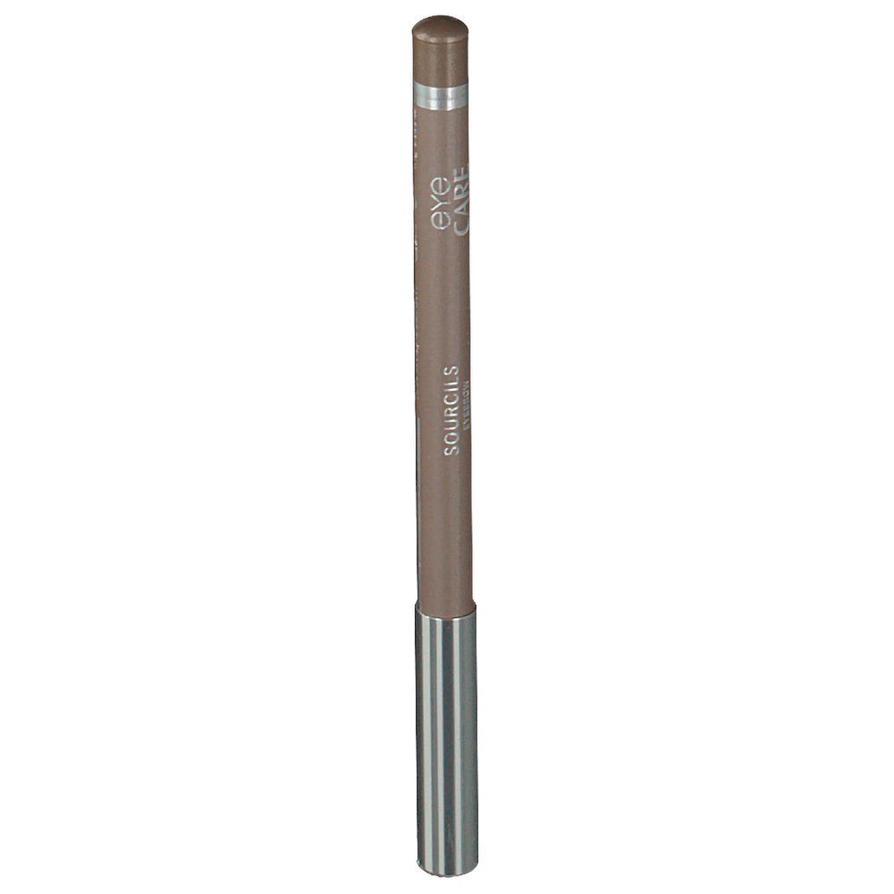 Crayon pour les yeux, taupe. Forme cylindrique. Embout argenté. Texte : EYE CARE SOURCILS.
