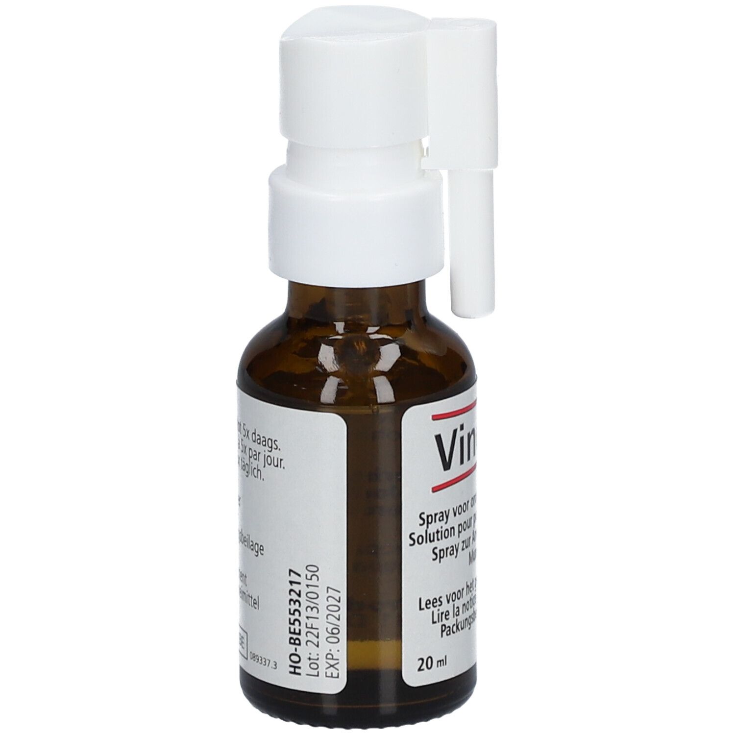 Flacon en verre brun avec pulvérisateur blanc. Étiquette avec informations produit. Marque Heel.