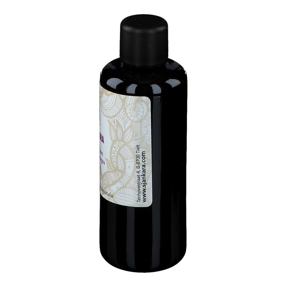 Flacon foncé avec bouchon noir. Étiquette avec nom du produit, logo et texte. Adresse du site web.