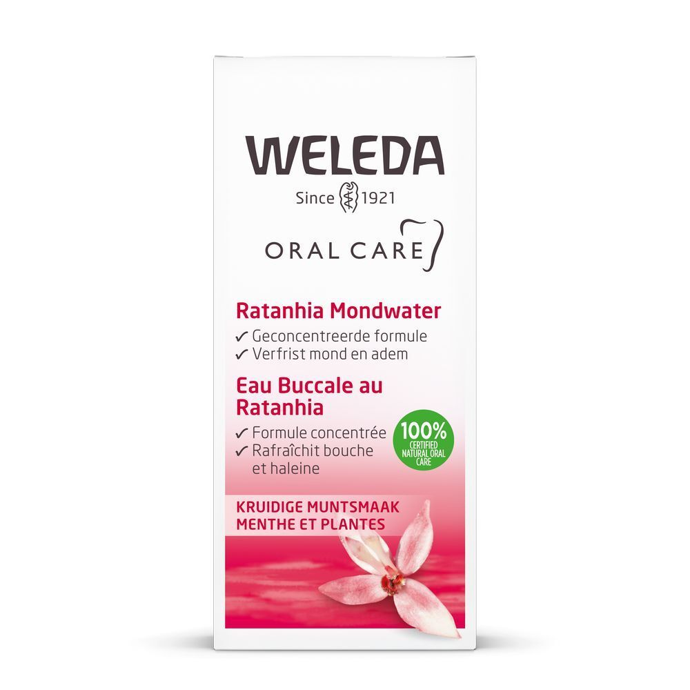 Witte verpakking met tekst: WELEDA, Oral Care, Ratanhia Mondwater, Eau Buccale au Ratanhia. Met 100% Natural Care zegel.