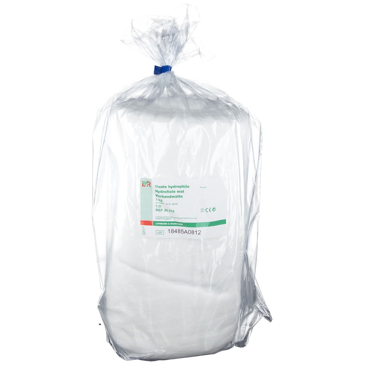 Rouleau de ouate hydrophile 1 kg, emballé dans un sac plastique transparent. Étiquette avec informations.