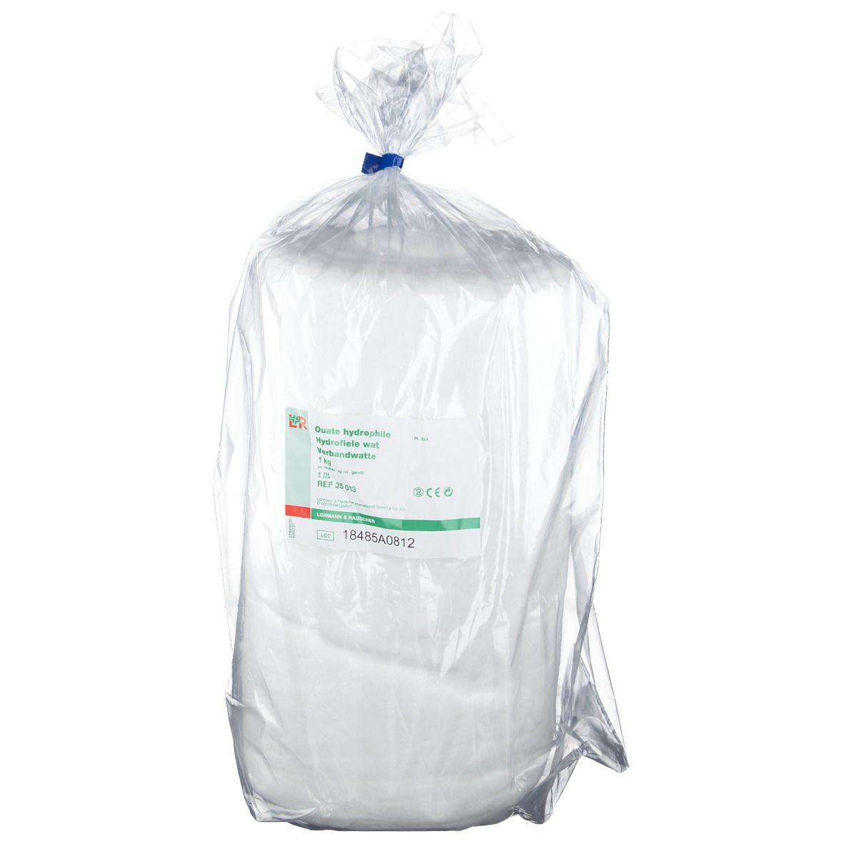 Rouleau de ouate hydrophile 1 kg, emballé dans un sac plastique transparent. Étiquette avec informations.