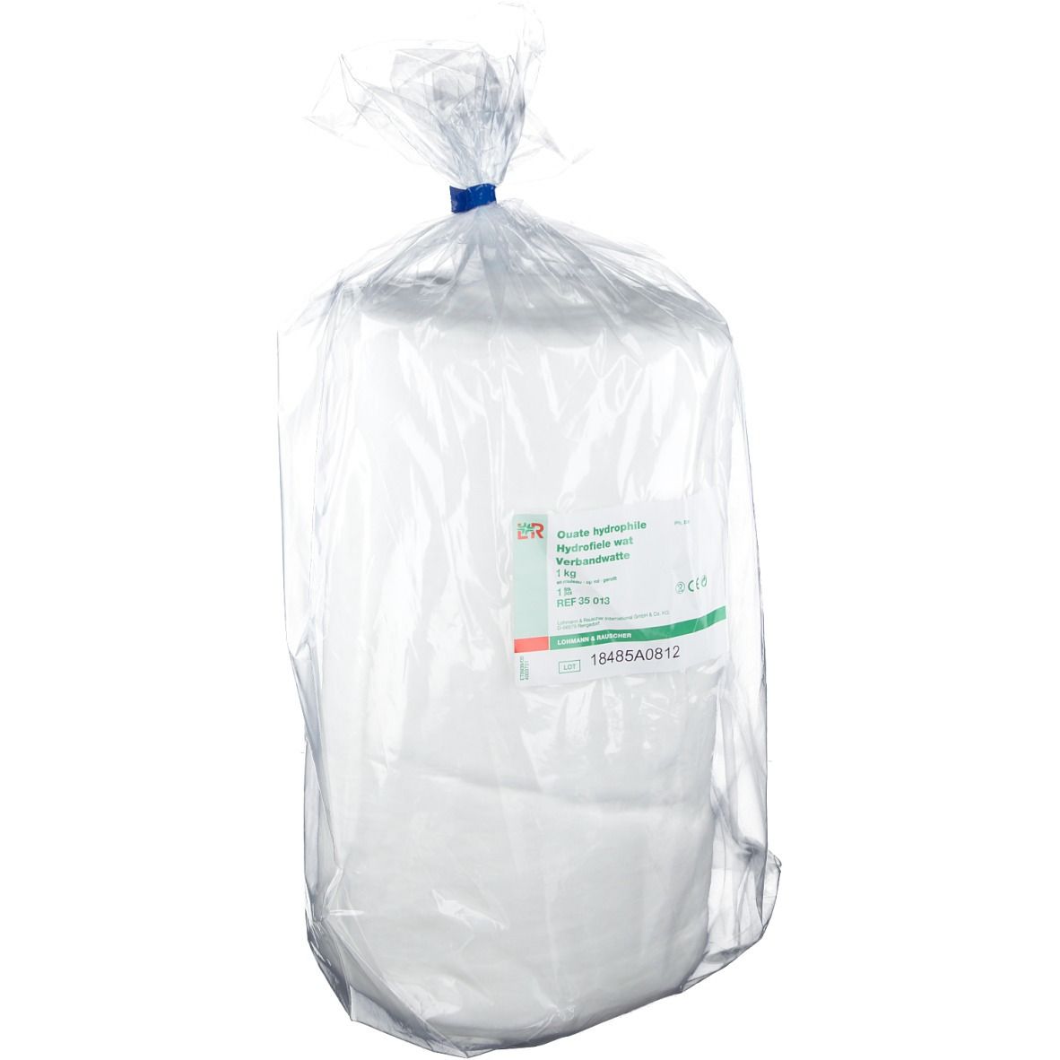 Rouleau de ouate hydrophile 1 kg, emballé dans un sac plastique transparent. Étiquette avec informations.