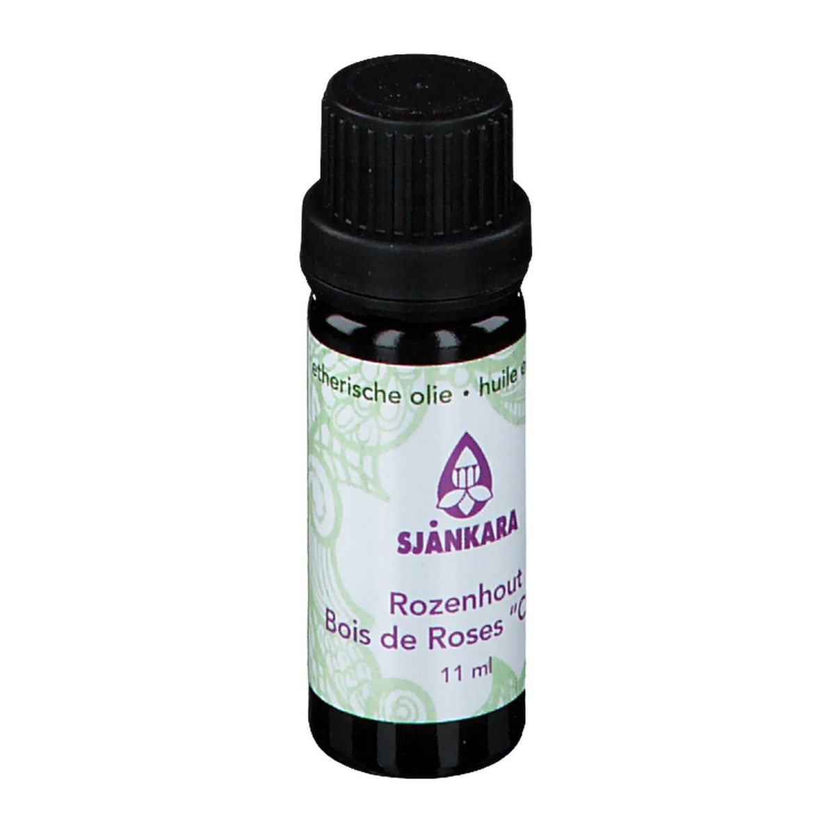 Flacon en verre brun avec bouchon noir. Étiquette avec logo et texte: SJANKARA Rosenholz, Bois de Roses "Cités", 11 ml.