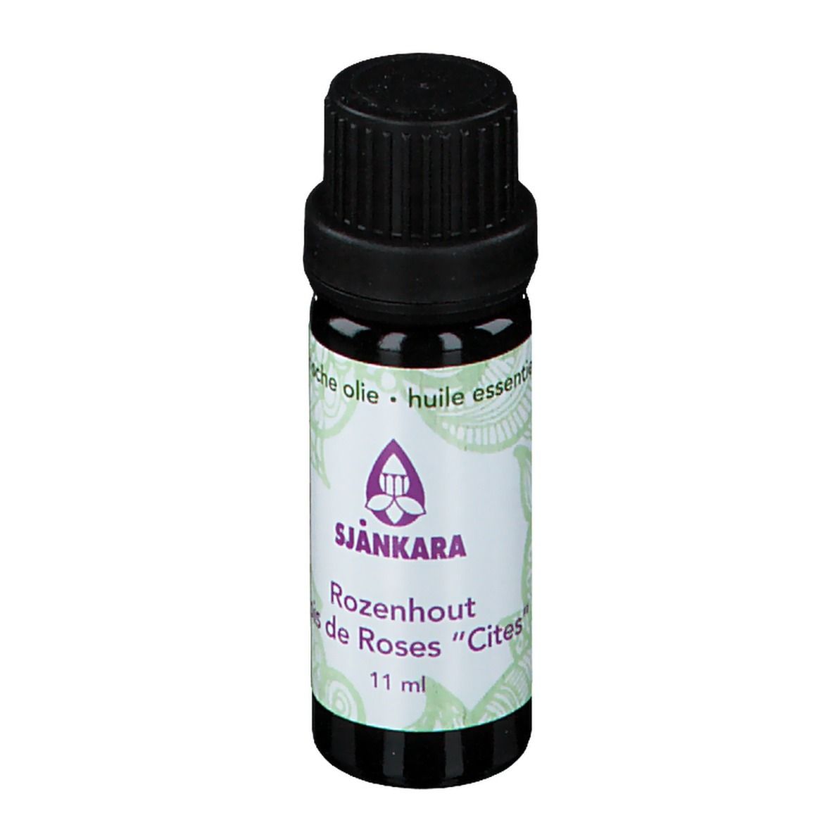 Flacon en verre brun avec bouchon noir. Étiquette avec logo et texte: SJANKARA Rosenholz, Bois de Roses "Cités", 11 ml.