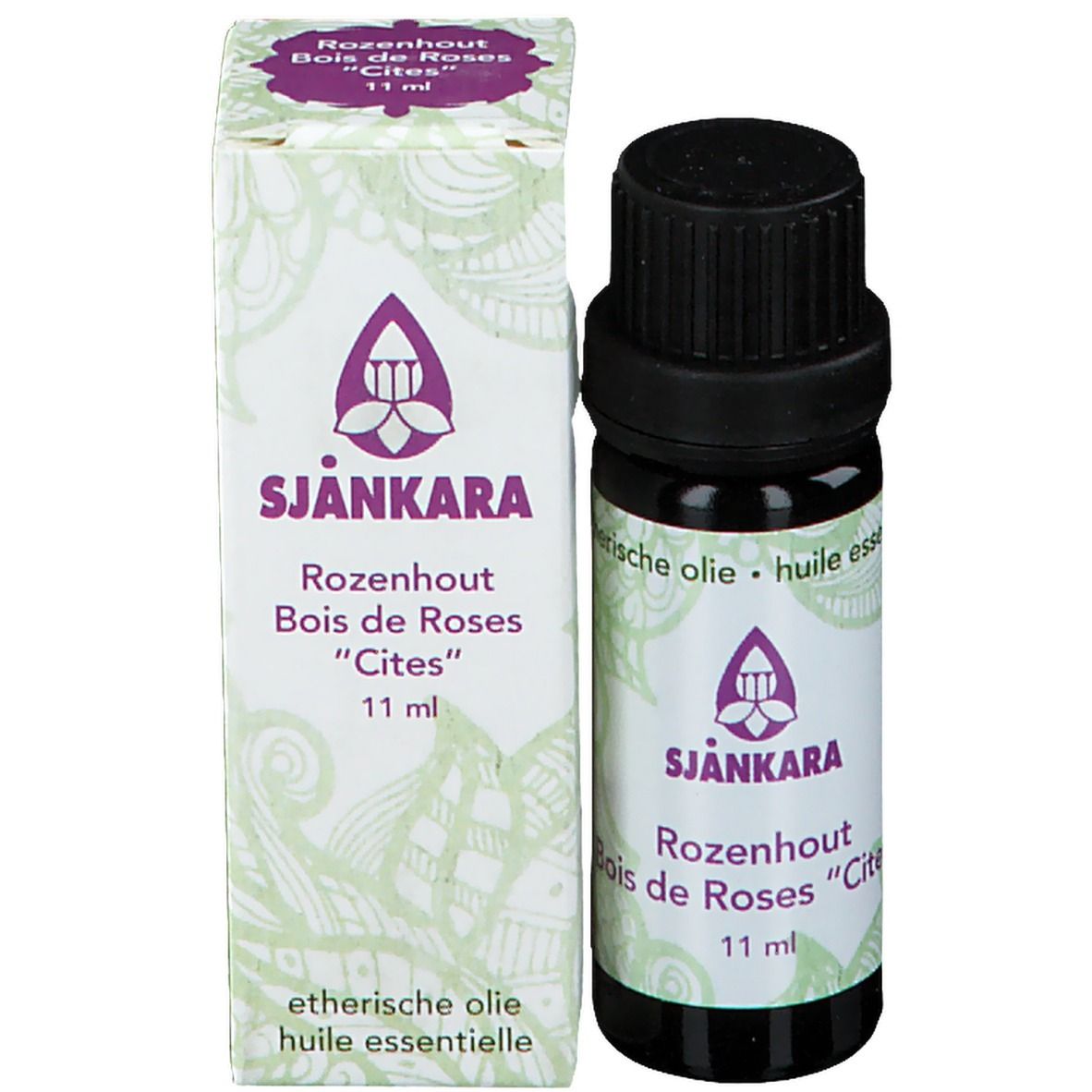 Flacon en verre brun et emballage en carton. Sur l'emballage: logo, SJANKARA, Rosenholz, Bois de Roses "Cités", 11 ml.