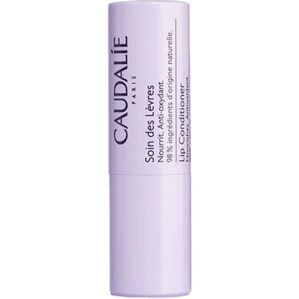 Stick pour les lèvres, cylindrique, lilas clair. Inscriptions: CAUDALIE PARIS, Soin des Lèvres, Lip Conditioner.