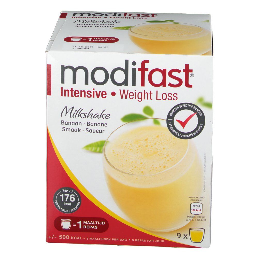 Verpakking Modifast Intensive Milkshake Banane. Rood logo met witte tekst. Gele drank in glas. 9 porties. 176 kcal per portie.