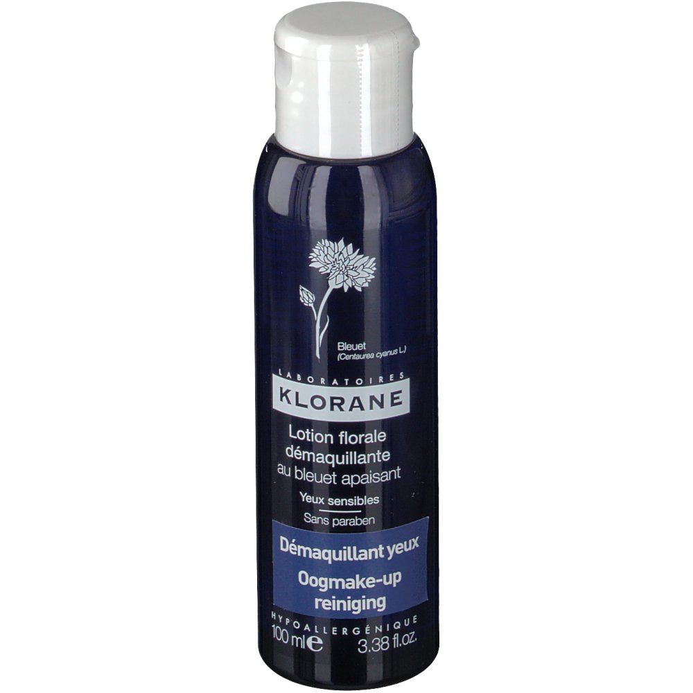 Flacon bleu foncé avec bouchon blanc. Inscription: KLORANE, Lotion florale, Démaquillant yeux, Oogmake-up reiniging.