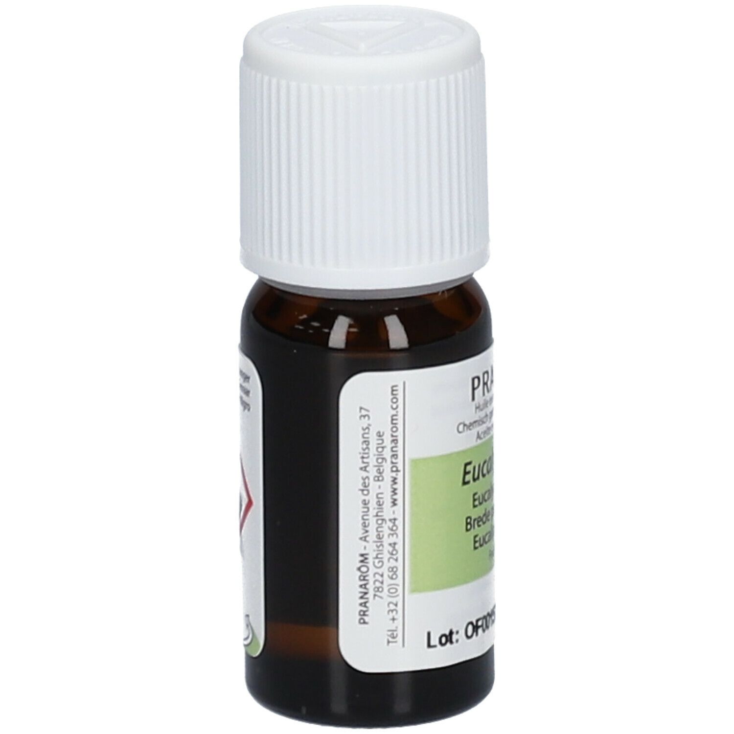Flacon en verre brun avec bouchon blanc. Étiquette avec informations produit et symboles de danger. Marque PRANAROM.