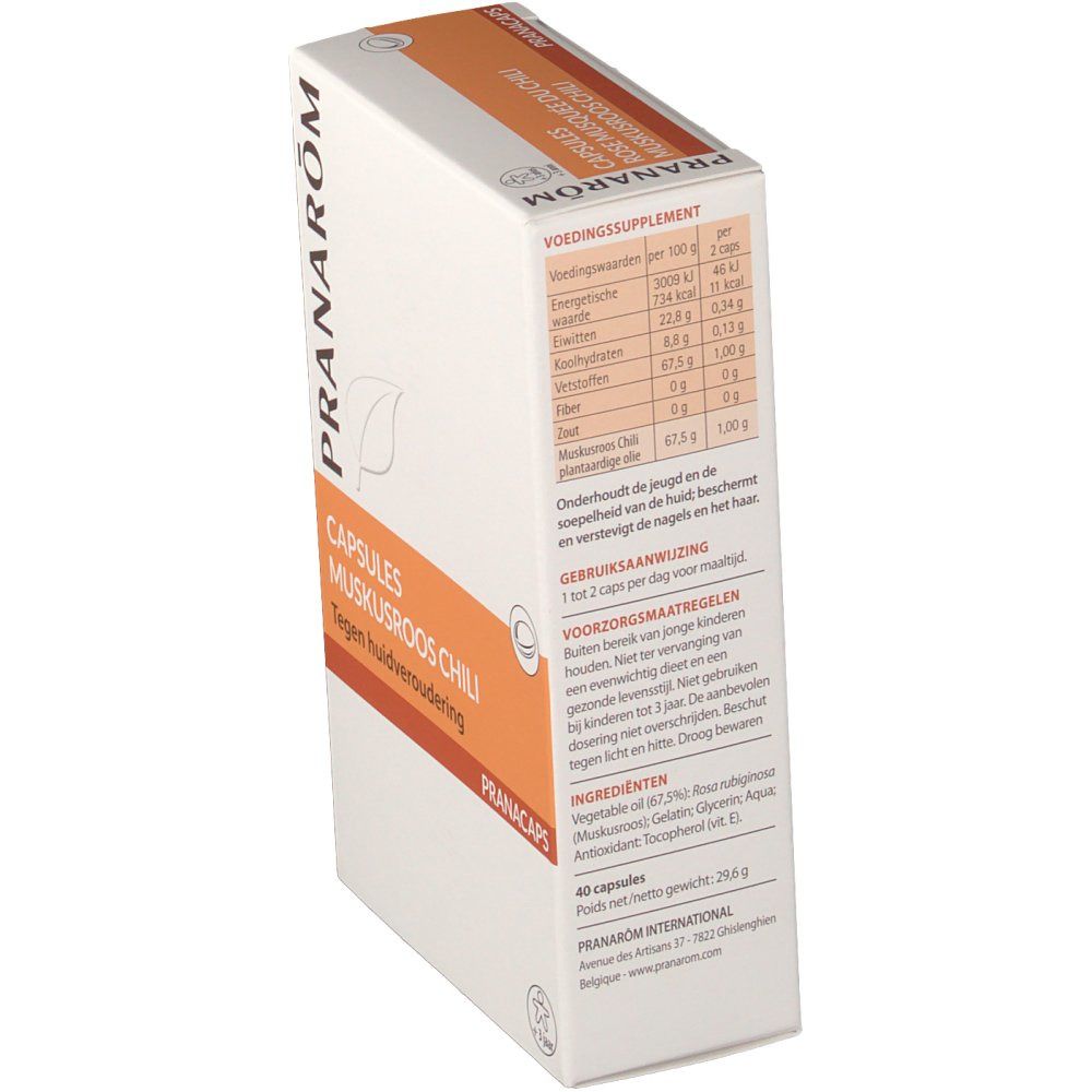Boîte en carton avec informations produit. Inscription: Pranarom, Capsules Muskusroos Chili, Tegen huidveroudering. Détails nutritionnels.