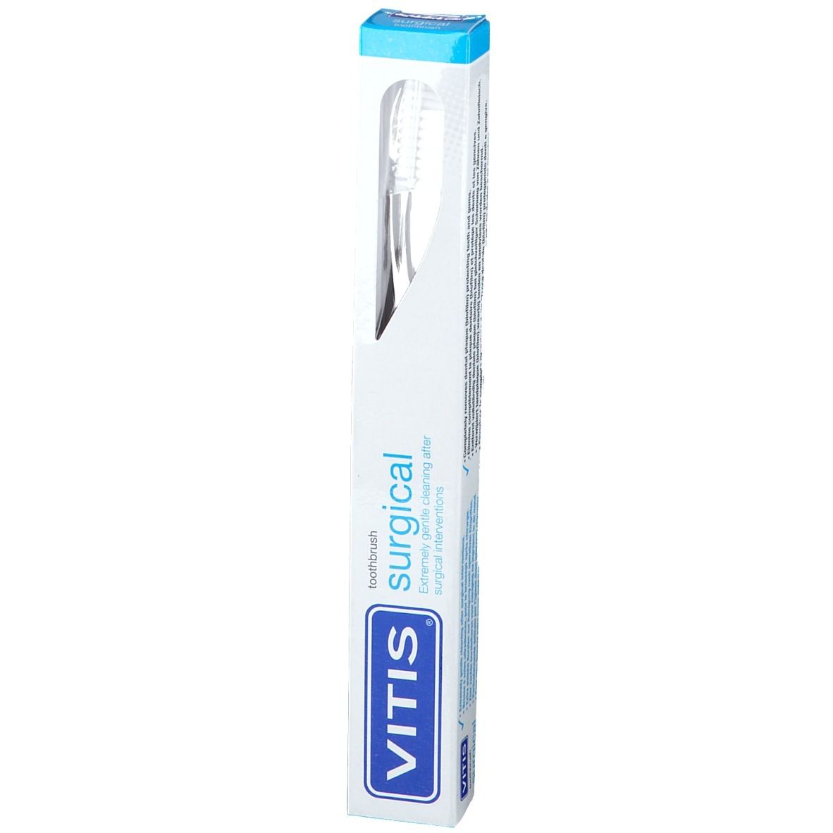 Brosse à dents VITIS Surgical dans son emballage. Manche blanc, soies grises. Emballage bleu et blanc avec nom du produit.