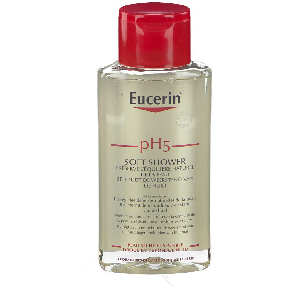 Flacon transparent avec bouchon rouge. Inscription: Eucerin pH5 Soft Shower. Produit pour peaux sèches et sensibles.