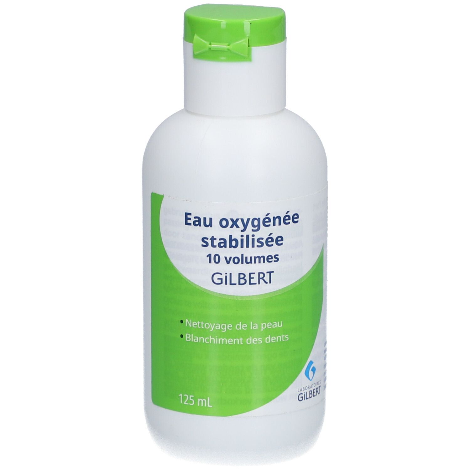 Witte fles met groen etiket. Tekst: Eau oxygénée stabilisée 10 volumes GILBERT. Voor huid en tanden. 125 ml.