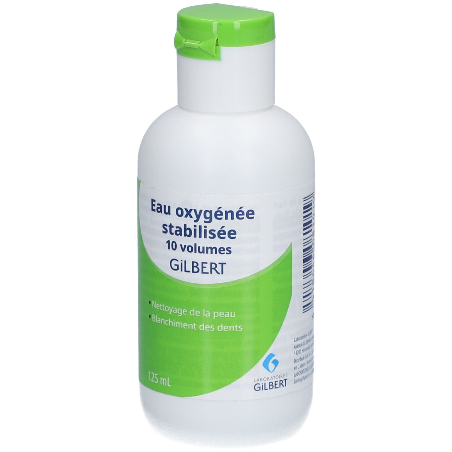 Witte fles met groen etiket. Tekst: Eau oxygénée stabilisée 10 volumes GILBERT. Voor huid en tanden. 125 ml.