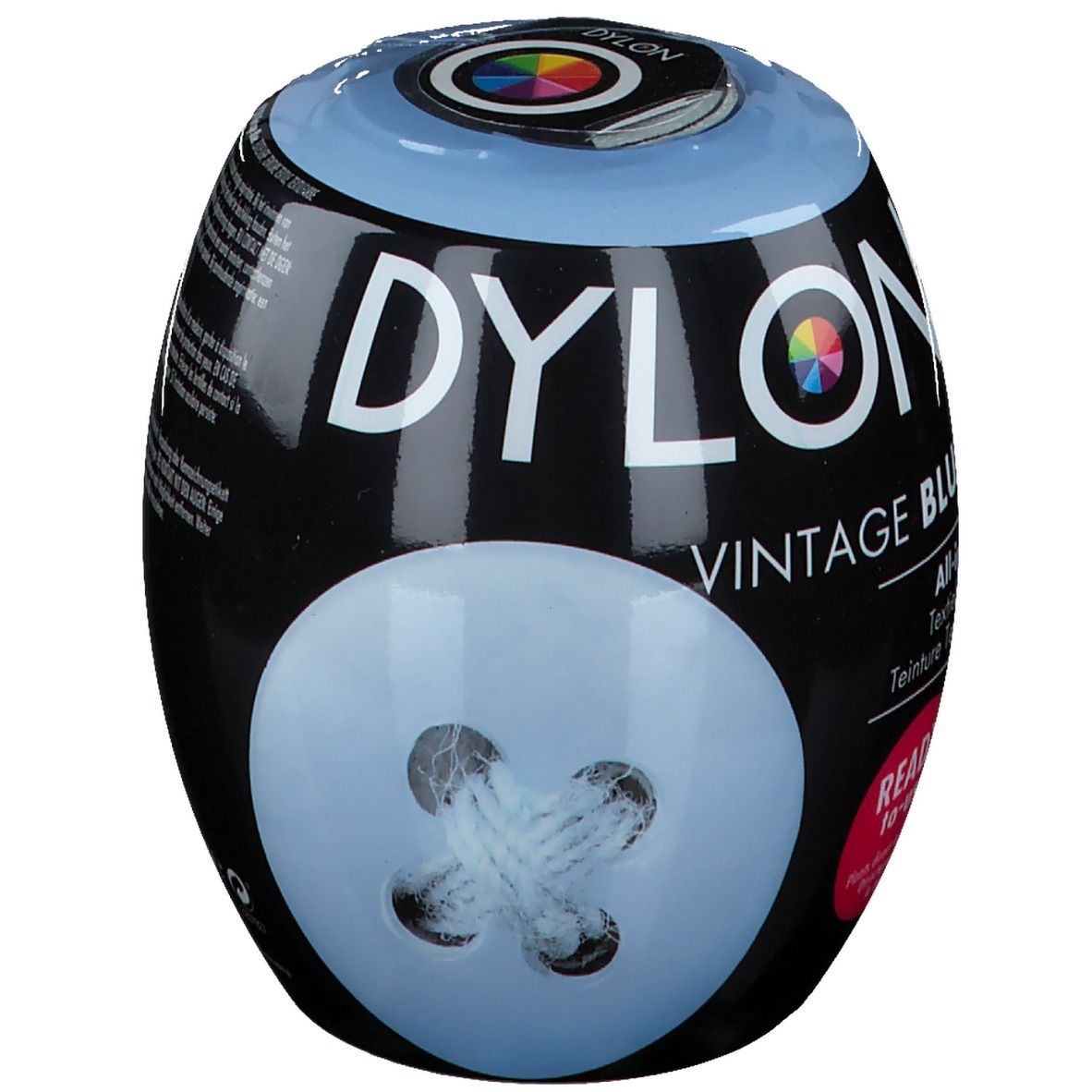 Dylon Colorant 6 Light Blue. Emballage noir ovale avec couvercle bleu. Inscriptions: Dylon, Vintage Blue, All-in-1. Design en forme de bouton.