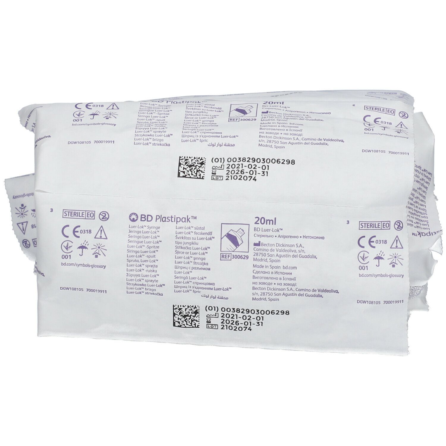Seringues emballées. Emballage individuel avec texte. Logo BD Plastipak™, indication 20 ml et Luer-Lock.
