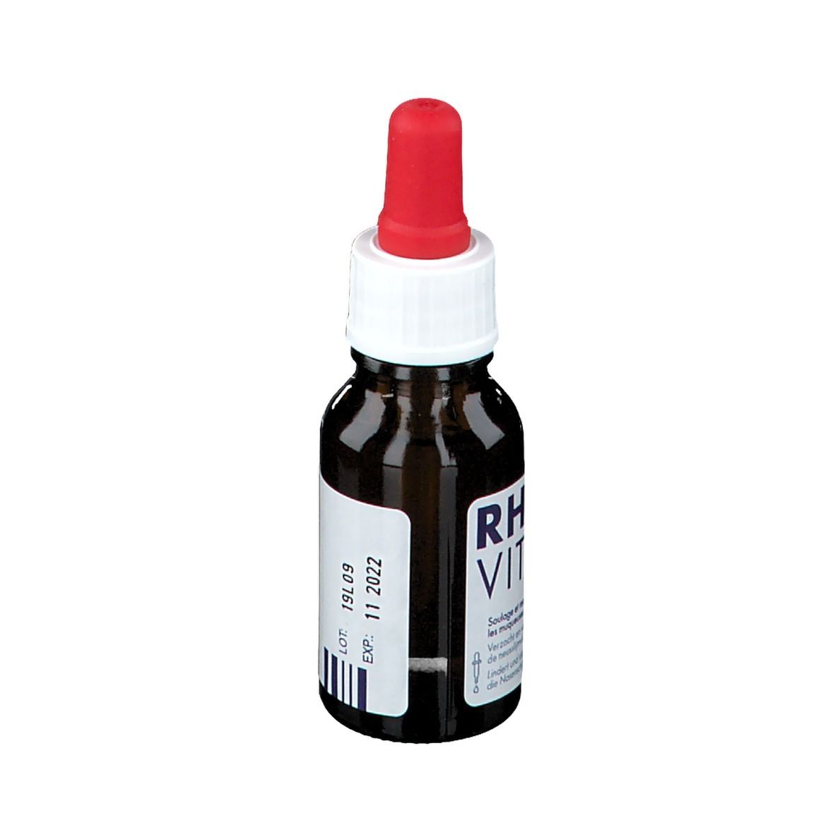 Bruine glazen fles met rode pipet. Opschrift: RHINO VITA. Tekst in het Duits en Frans. Lotnummer en vervaldatum.