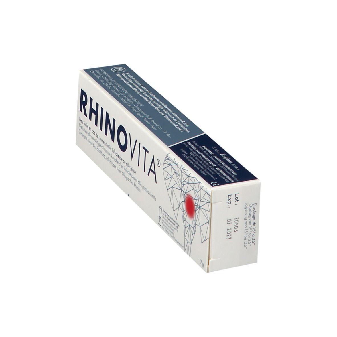 Boîte blanche inclinée RHINOVITA. Texte multilingue. Illustration d'une tête avec point rouge. Détails du produit et date d'expiration.