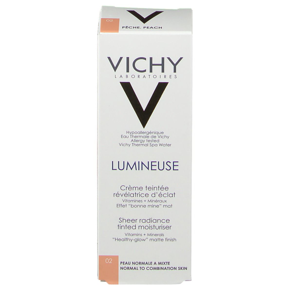 Emballage de VICHY Lumineuse Mate Nr. 02 pêche. Inscriptions: VICHY, LUMINEUSE, Crème teintée révélateur d'éclat. Avec texte et indicateur de teinte.