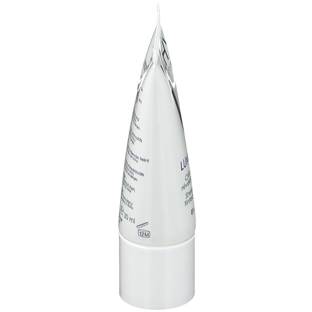 Tube blanc, vue latérale. Nom du produit et texte visibles. 30 ml.