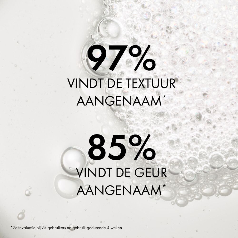 Close-up vloeistof met bellen. Tekst: 97% vinden de textuur aangenaam, 85% de geur.