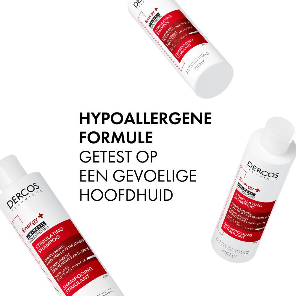 Drie shampoo flessen. Wit, met rode en zwarte tekst. Opschrift: Dercos, Stimulating Shampoo.