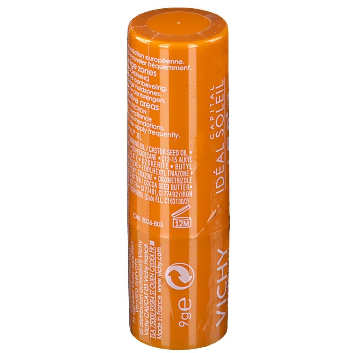 Stick solaire orange. Dos avec texte, code-barres et ingrédients. Forme cylindrique.