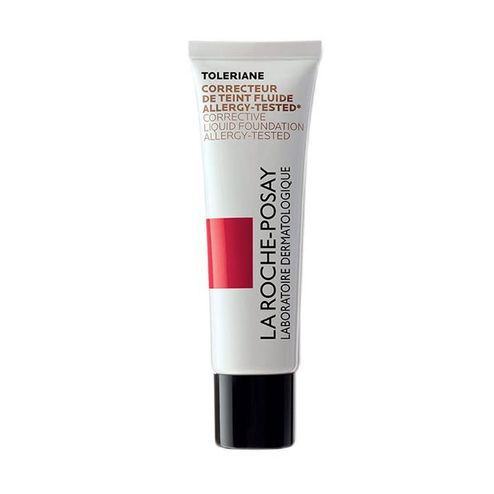 Tube blanc, bouchon noir. Bande rouge et texte. Toleriane, Correcteur de Teint Fluide, Testé contre les allergies.