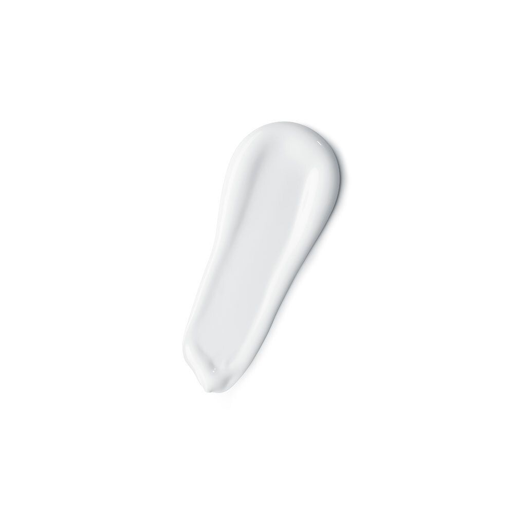 Produit blanc sur fond blanc. Texture crème.