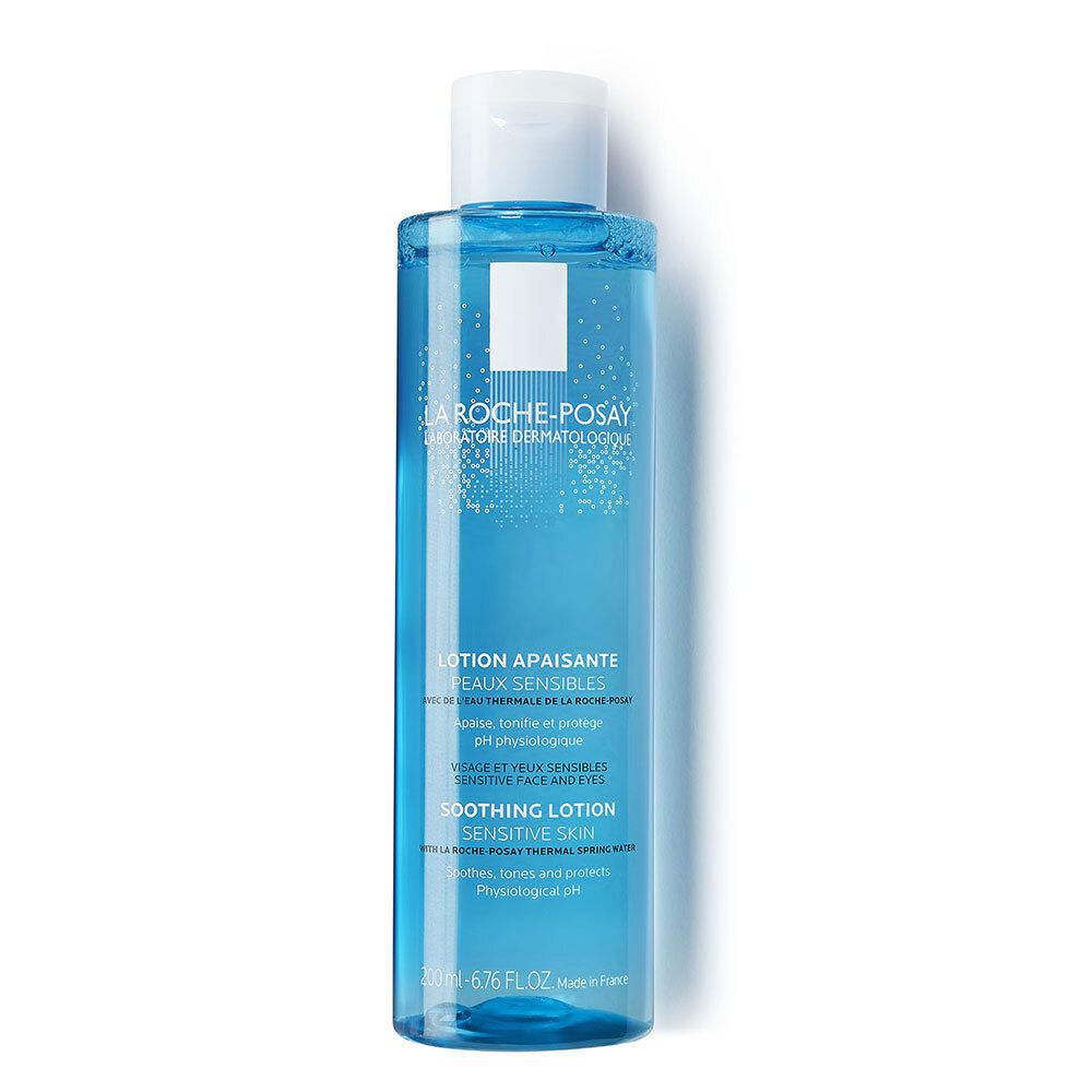 Flacon bleu avec bouchon blanc. Inscription La Roche-Posay. Lotion pour peaux sensibles. 200 ml.