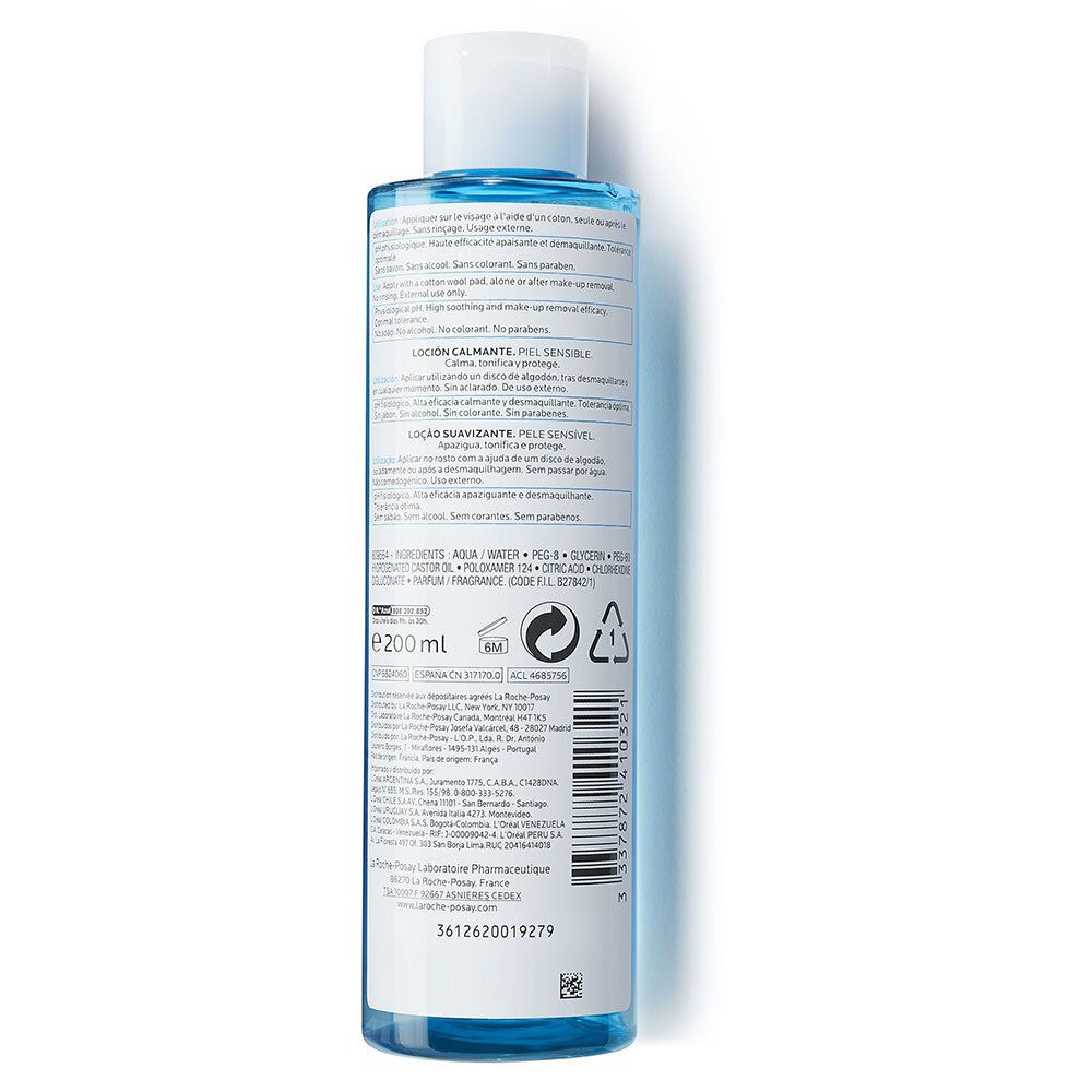 Dos du flacon bleu. Texte multilingue. Ingrédients, informations fabricant et symboles de recyclage.