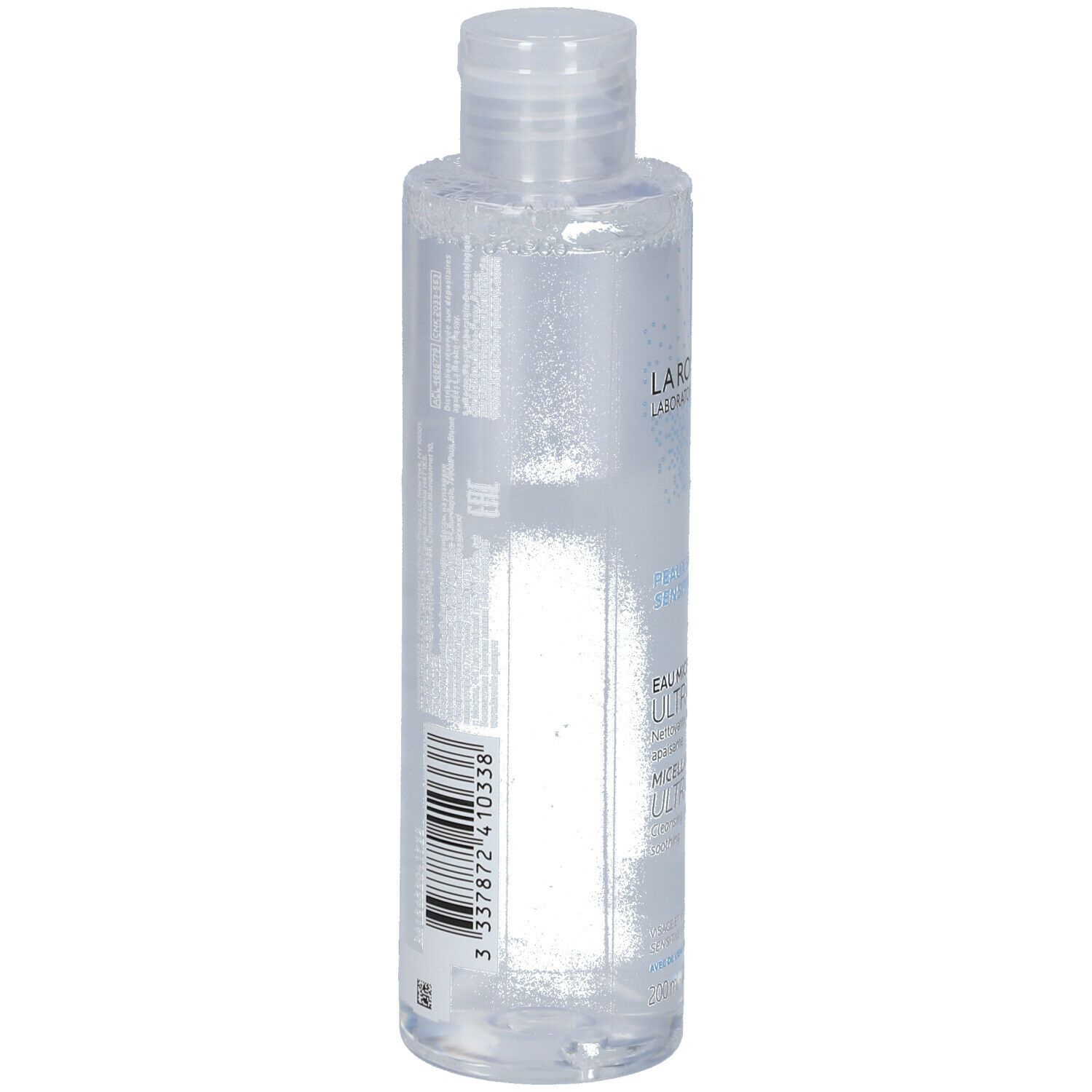 Dos d'un flacon transparent. Code-barres et texte. Produit: La Roche-Posay Eau Micellaire Ultra.