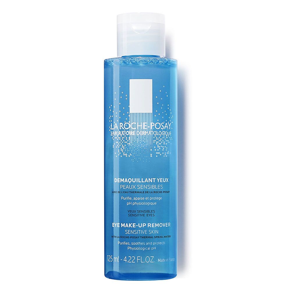 Blauwe transparante fles met witte dop. Tekst: La Roche-Posay, Demáquillant Yeux, 125 ml.