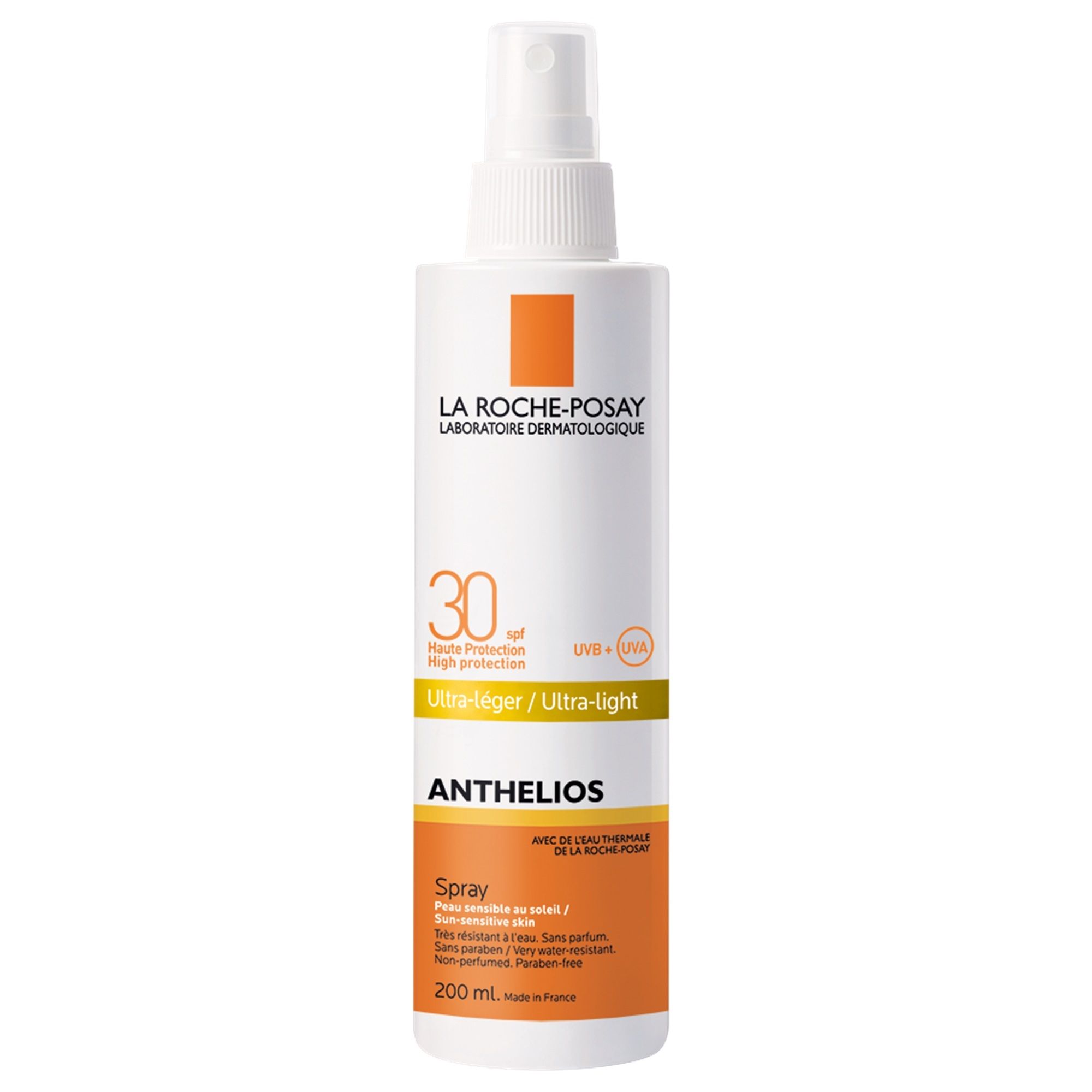 Spray solaire Anthelios. Flacon blanc, détails orange. Inscription: LSF 30, Ultra-léger.