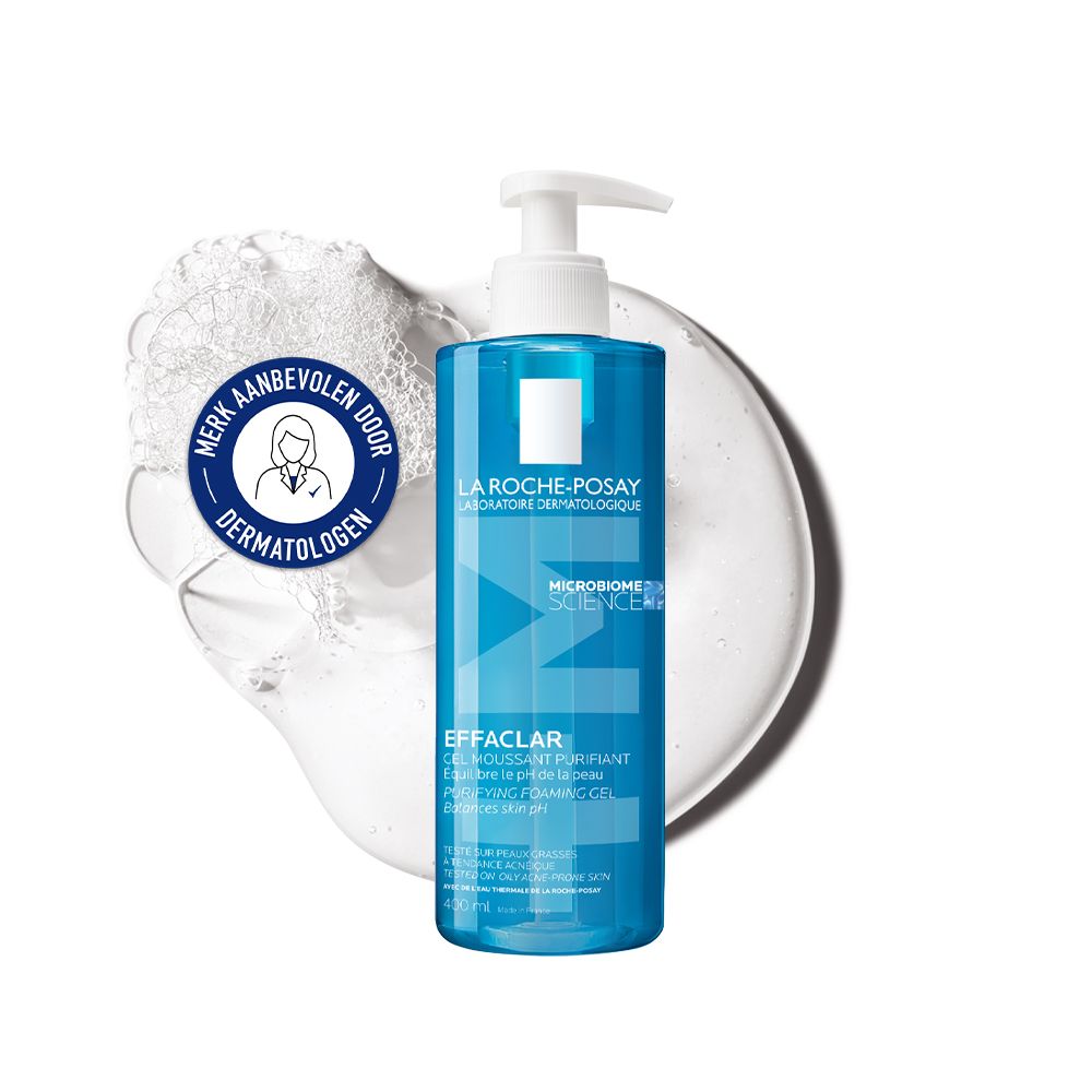 Blauwe fles met witte pomp. Schuim en logo.