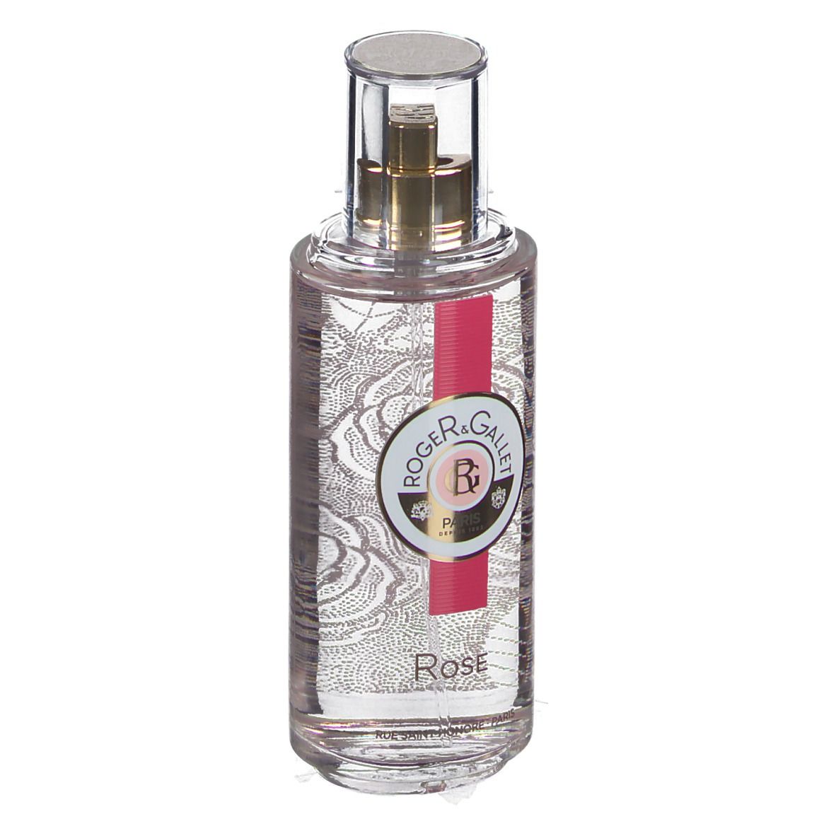 Transparante fles met gouden verstuiver. Label met logo en tekst. Rode streep. Opschrift Rose.